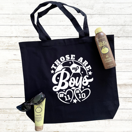 Those are my Boys Soccer Mom Tote Bag with Jersey Numbers and Back Personalization Option