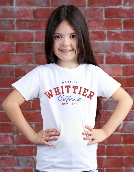Limited-time "Made in Whittier" shirt for just $15! Available in youth sizes XS-XL and adult unisex sizes XS-5XL (extended sizes available for an additional charge). Show your local pride with this stylish shirt, perfect for next-day pickup in Whittier. Ideal for all ages, celebrate Whittier with this fun, affordable shirt!